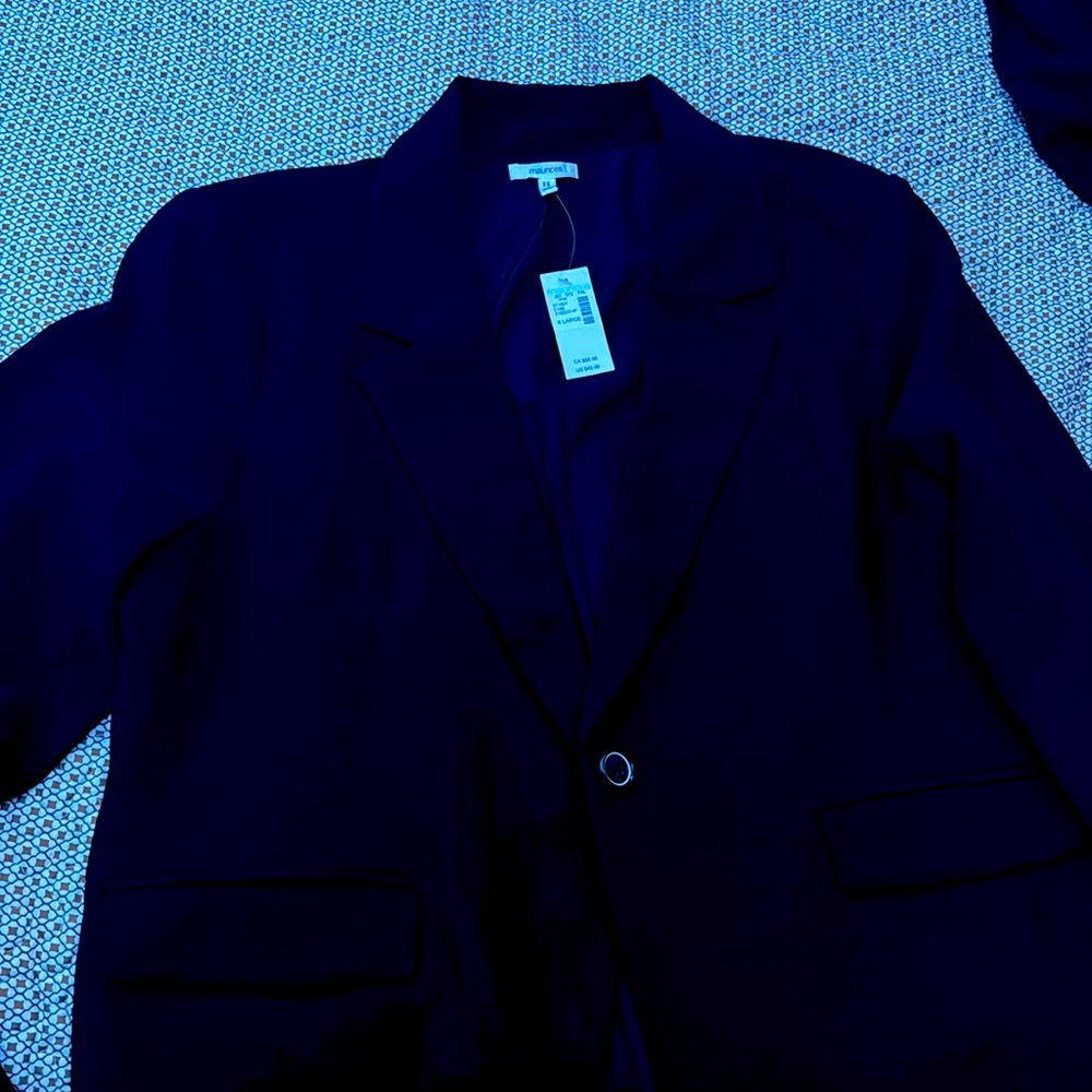 Brand new with tags black blazer. XL